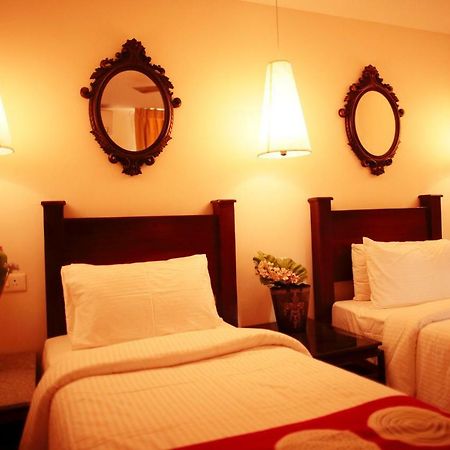 Hotel Highnest Singapperumalkovil Luaran gambar