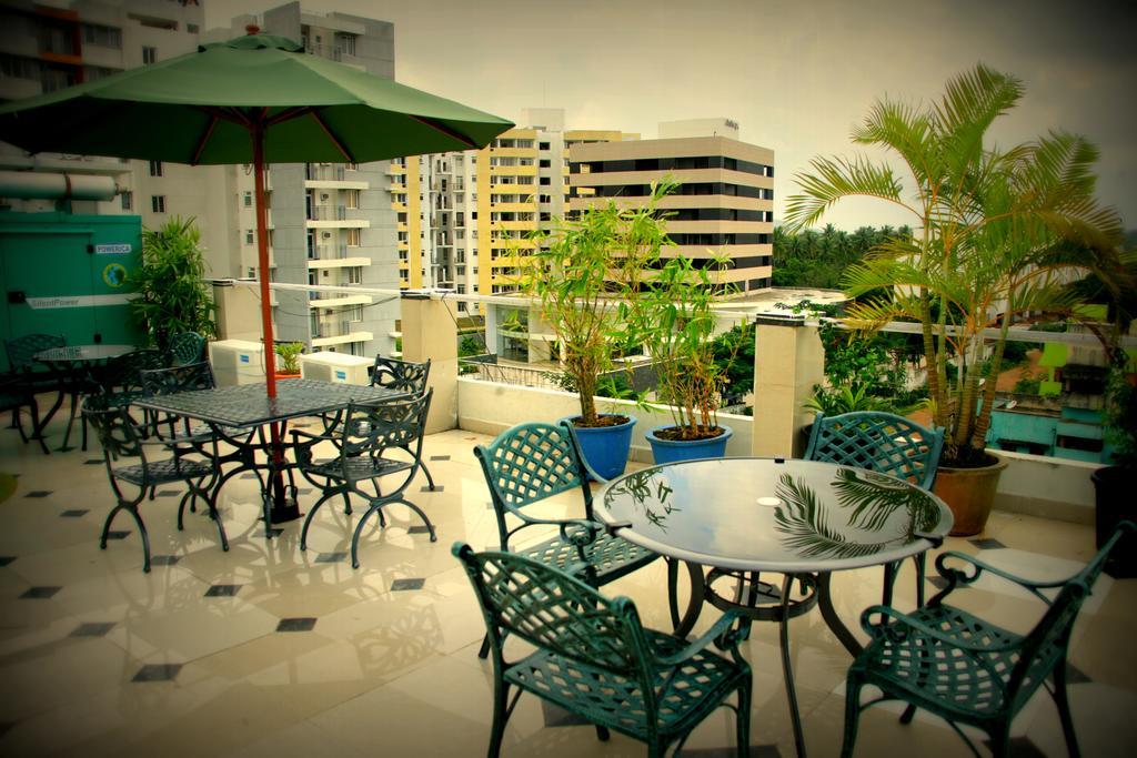 Hotel Highnest Singapperumalkovil Bilik gambar