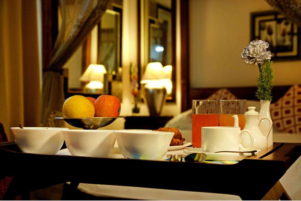 Hotel Highnest Singapperumalkovil Bilik gambar