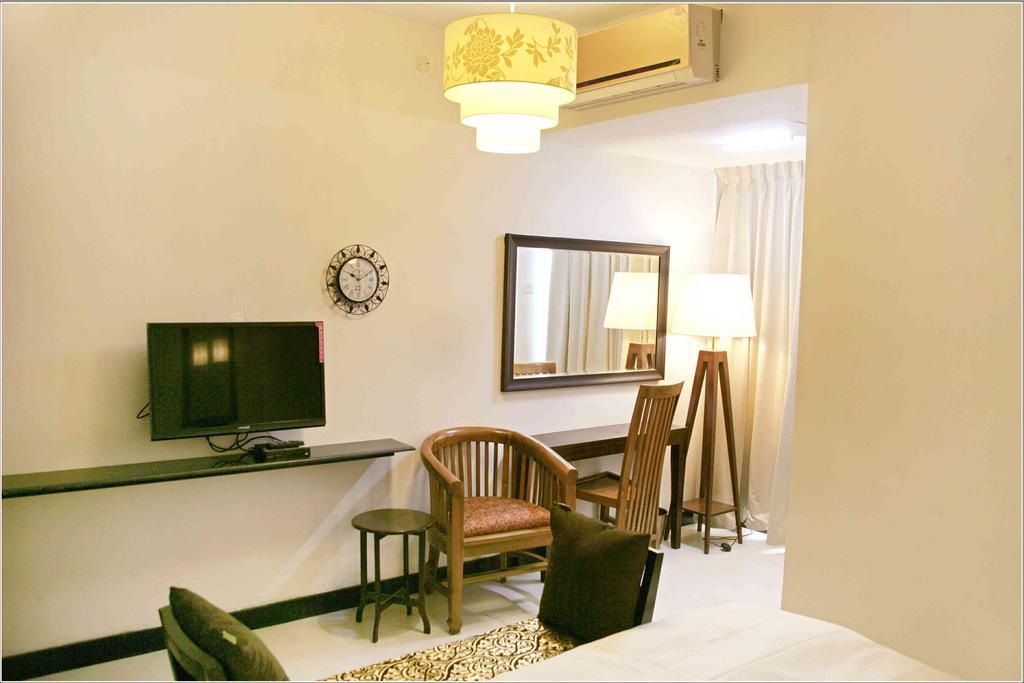 Hotel Highnest Singapperumalkovil Bilik gambar