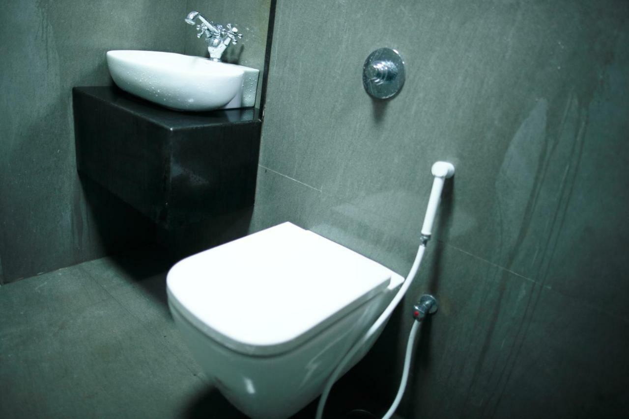 Hotel Highnest Singapperumalkovil Luaran gambar
